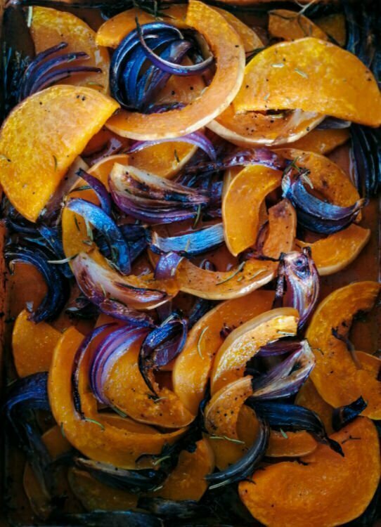 a tray of roasted pumpkin and caramelized onions