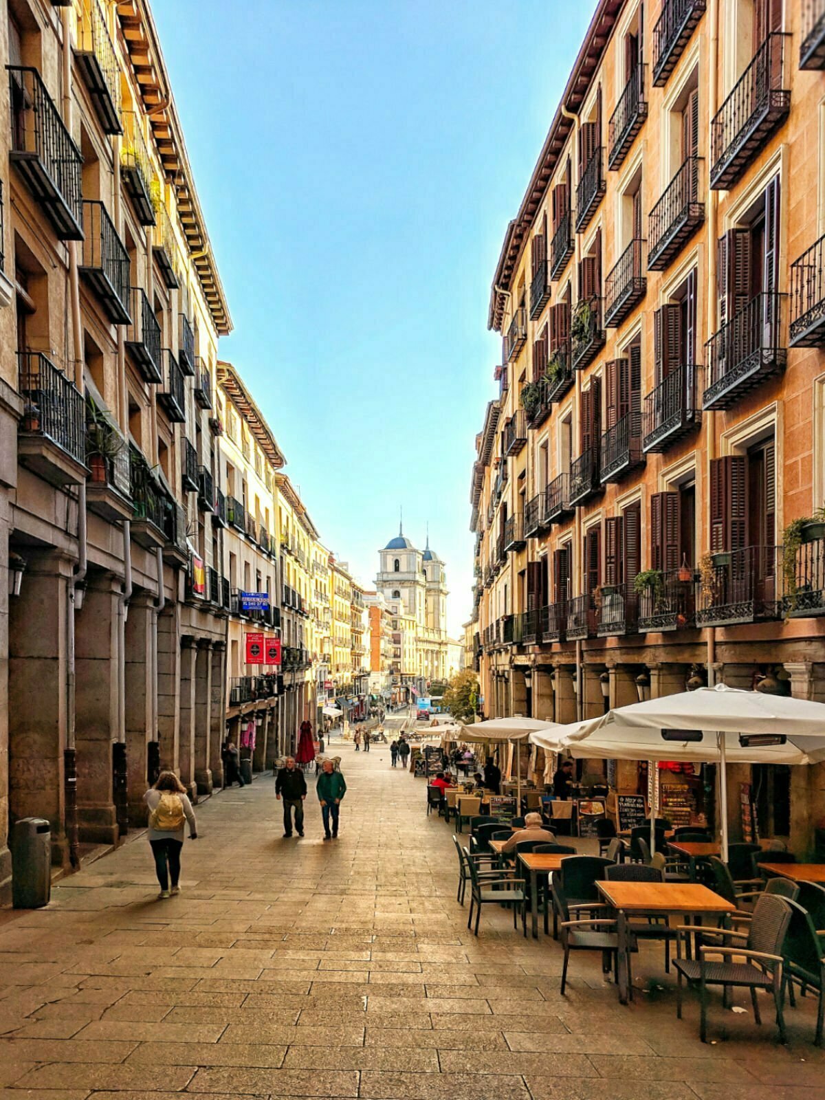 a street scene of plaza Major between the buildings and tapas bar terraces