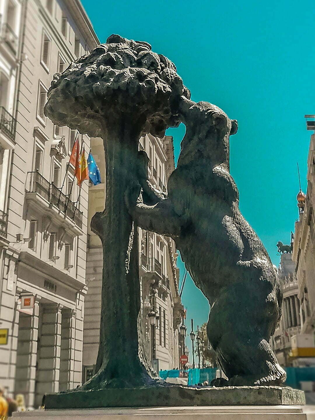 the iconic bear and the strawberry tree sculpture in central madrid