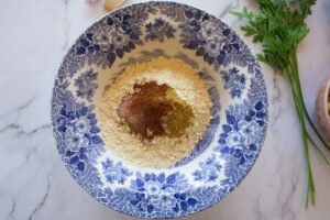 chickpea flour and spice sit in a decorated bowl
