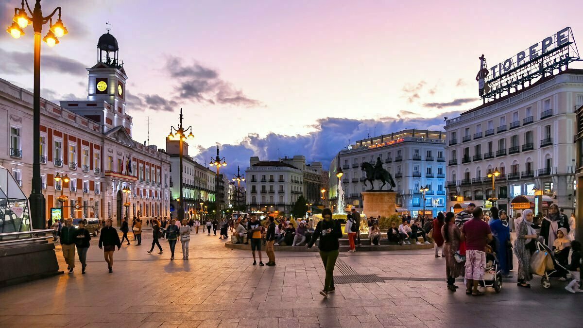 An even landscape scene of Puerta del Sol in Central madrid