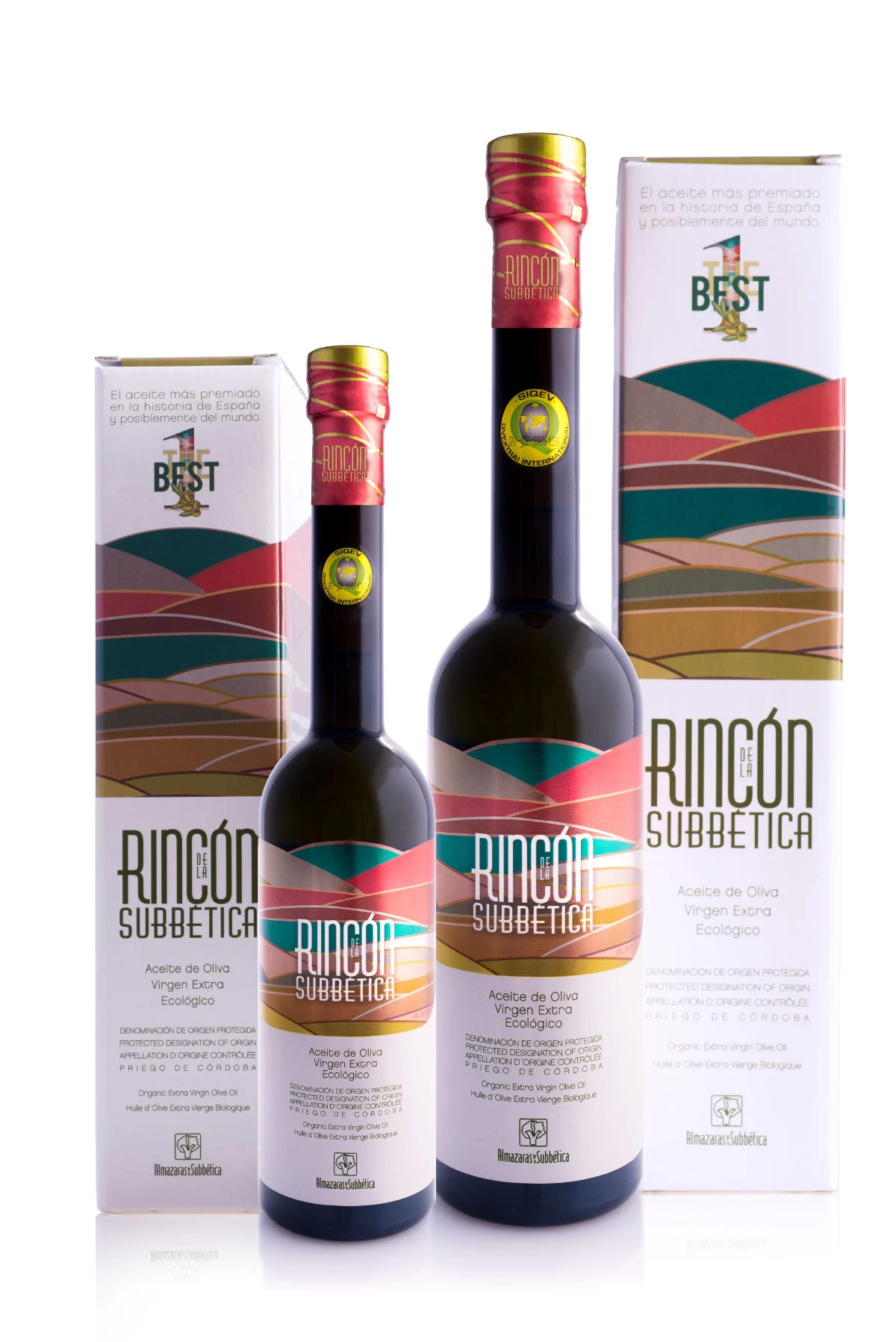2 bottle of Rincón de la Subbética extra virgin olive oil sit beside gift boxes