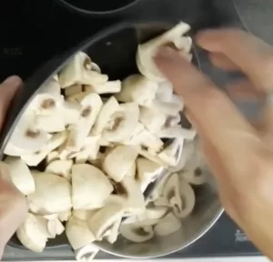 mushrooms are placed into some boiling water