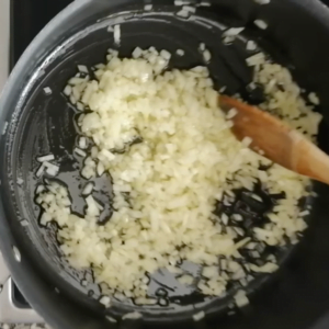 diced onion in a pan