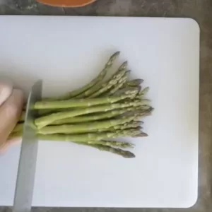 Asparagus spears are cut in half