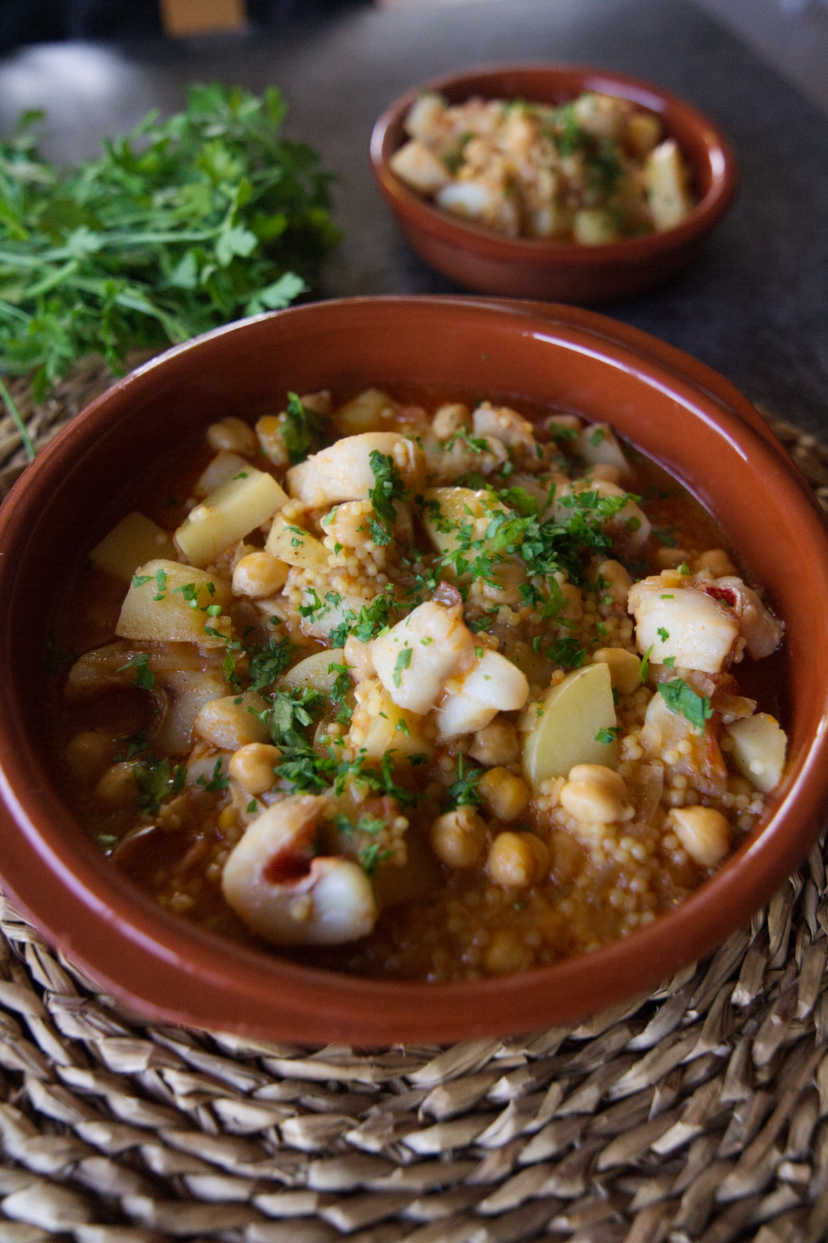A small cermaic bowl of maravilla fish stew