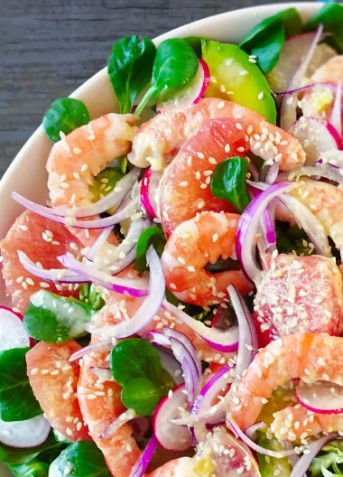 A plate of shrimp and avocado salad.