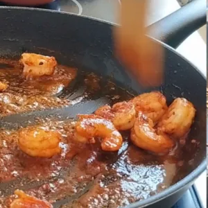 shrimp in a pan with spices.