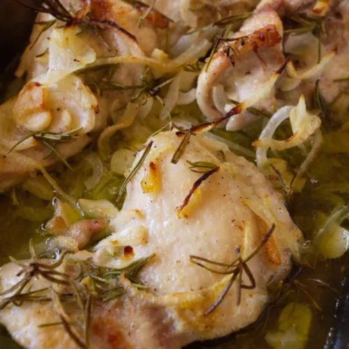 A pan of Mediterranean garlic rosemary chicken thighs.
