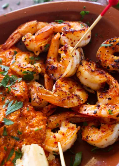 A tapas serving of spicy shrimp with romesco sauce. 
